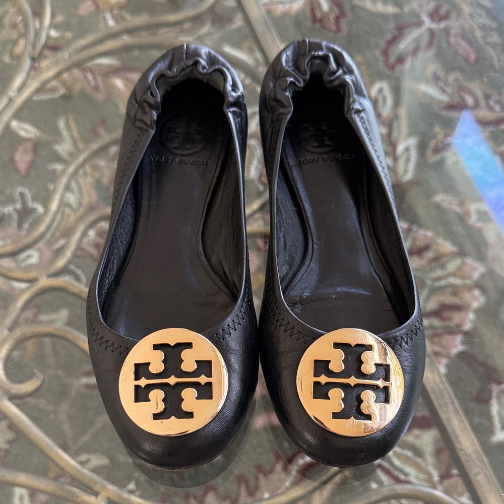 Tory Burch Gorgeous Black Flats with Gold Emblem